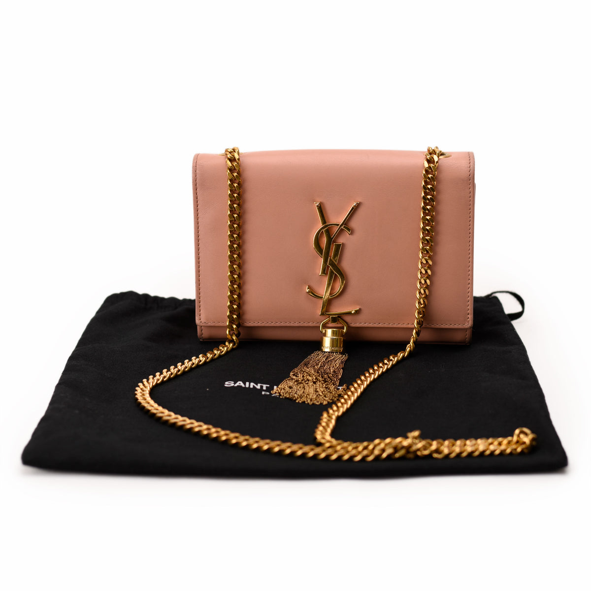 Dusty pink leather Saint Laurent crossbody bag with gold YSL logo and chain strap, curated Pre-loved Luxury by Myluxe in Helsinki.